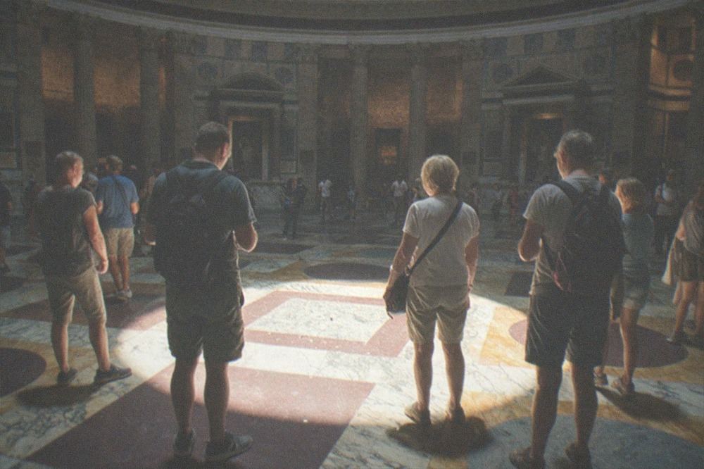 Sunlight from the oculus falling across the marble floor inside the Pantheon