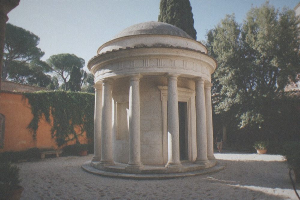 Small domed Renaissance temple in a quiet cloister courtyard