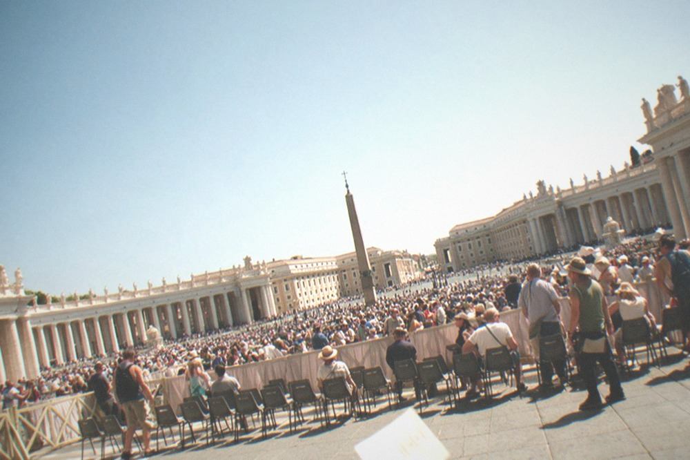 Crowds gathered in St Peter's Square beneath the colonnades