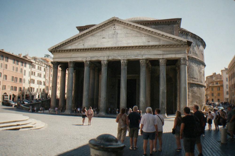 The granite columns and pediment of the Pantheon portico seen from the square