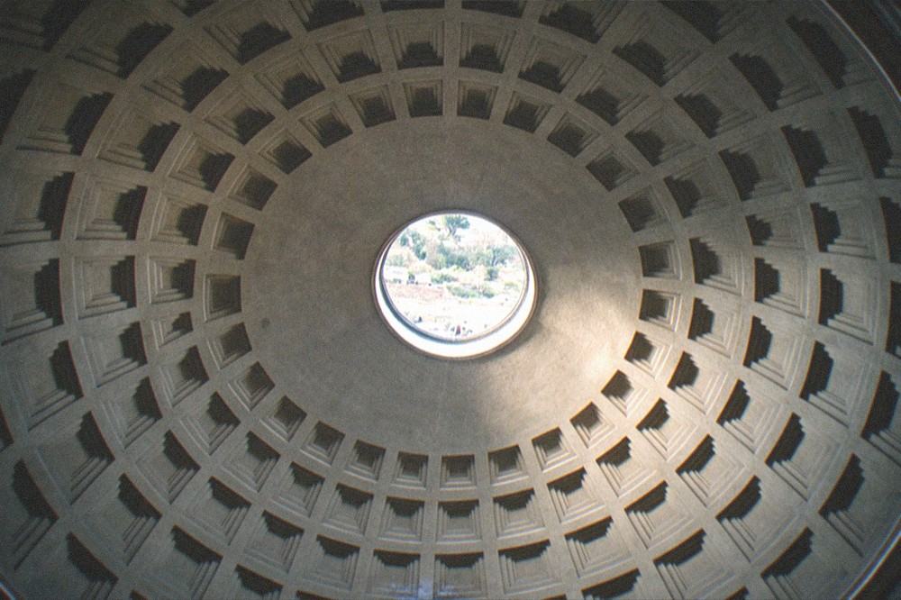 The coffered concrete interior of the Pantheon dome rising to the oculus