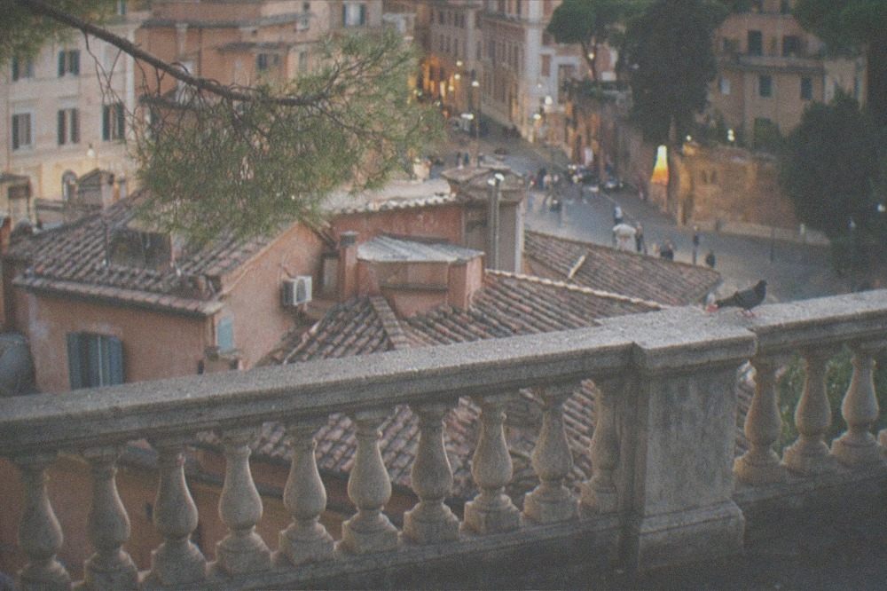 Balustrade of the Pincio terrace with pine trees framing rooftops of Rome